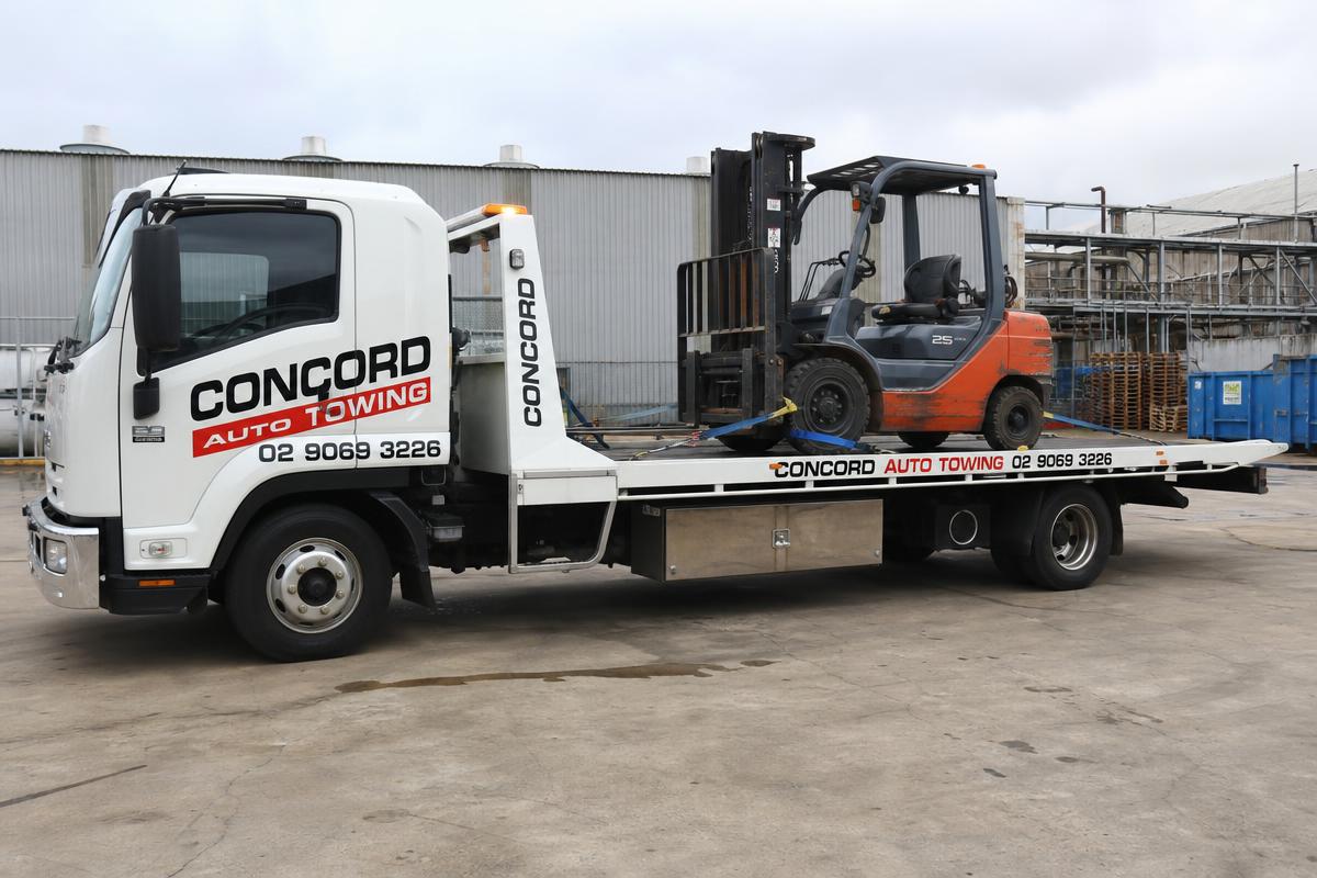 Forklift towing service by Concord Auto Towing